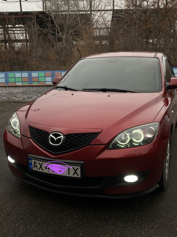 Mazda 3.        .