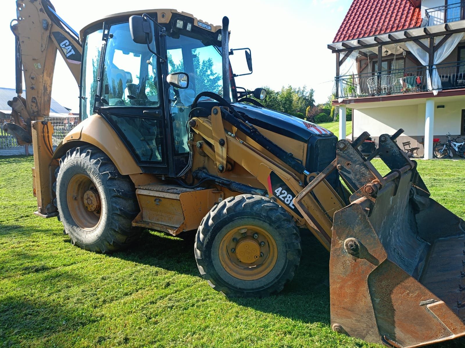 Koparko-ładowarka Caterpillar 428 E 2 klima 5 biegów    koparka  f vat