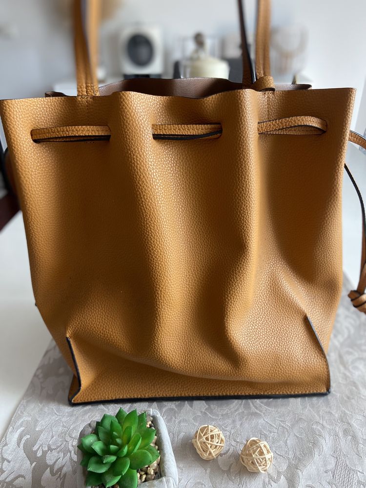 Bolsa amarro torrada marca Zara