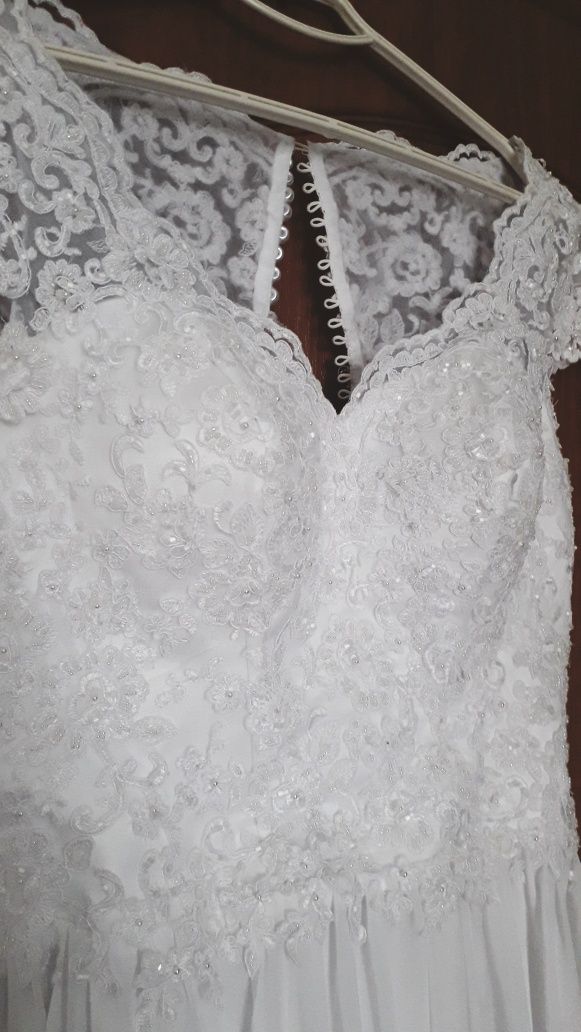 Весільна сукня пошита на замовлення