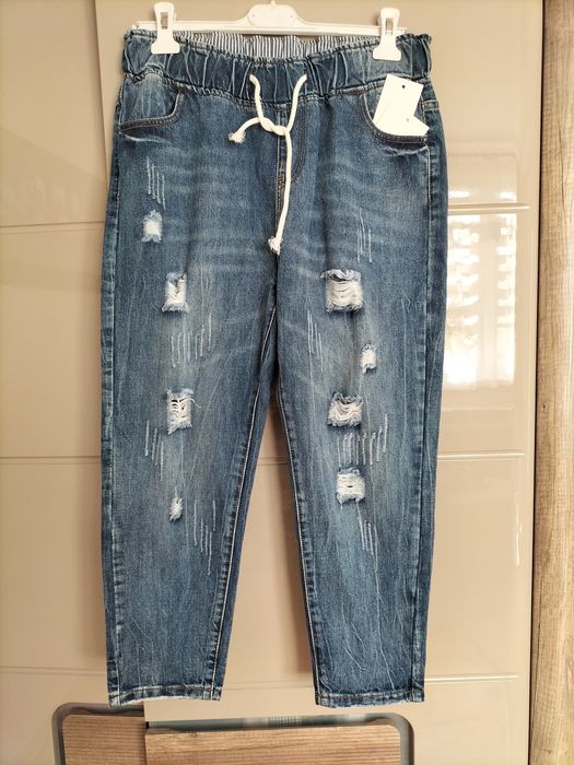 Nowe spodnie jeansy 42