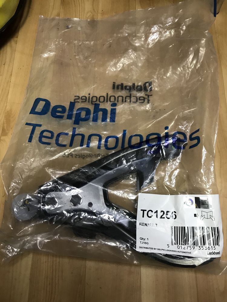 Важіль передньої підвіски нижній лівий TC1256 Delphi (7700430765)