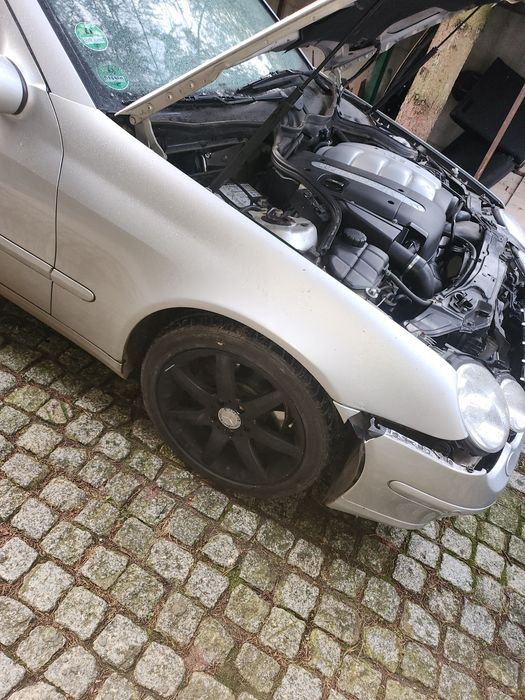 Blotnik prawy i lewy Mercedes C sport cupe 203 w kolo
