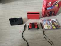 Nintendo Switch OLED Mario Red Edition + 2 gry – stan bardzo dobry!
