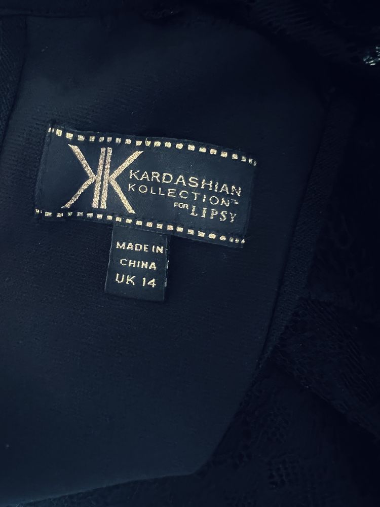 Sukienka wieczorowa KK Kardashian 42 czarna ołówkowa elastyczna błysk