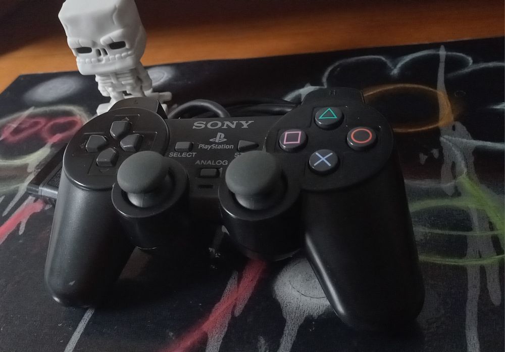 Jogos e comando Playstation 2