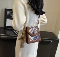 Жіноча сумочка з вишивкою