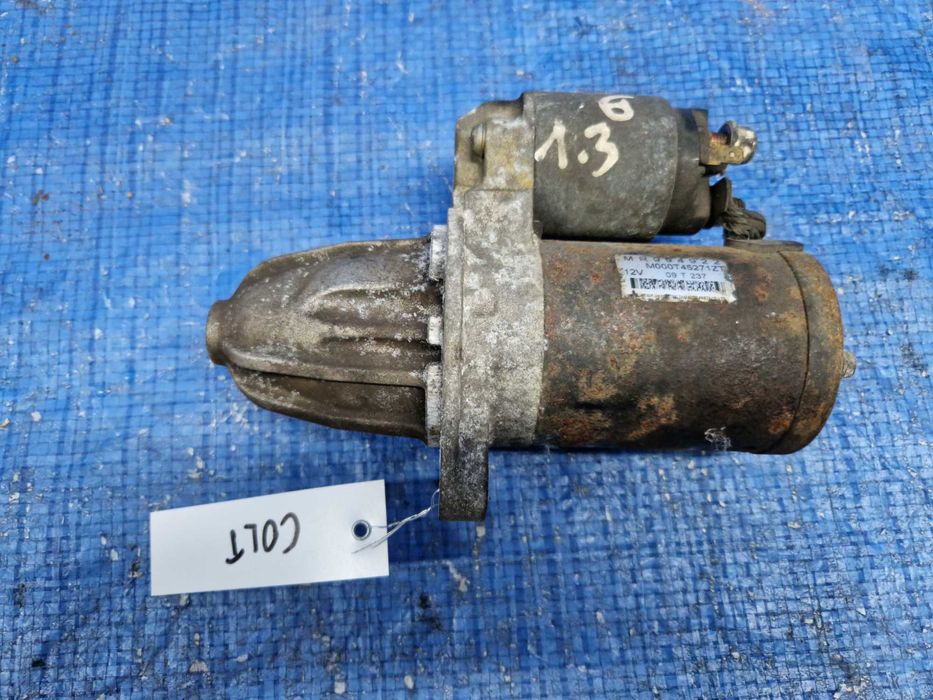 Mitsubishi Colt rozrusznik alternator Oryginał