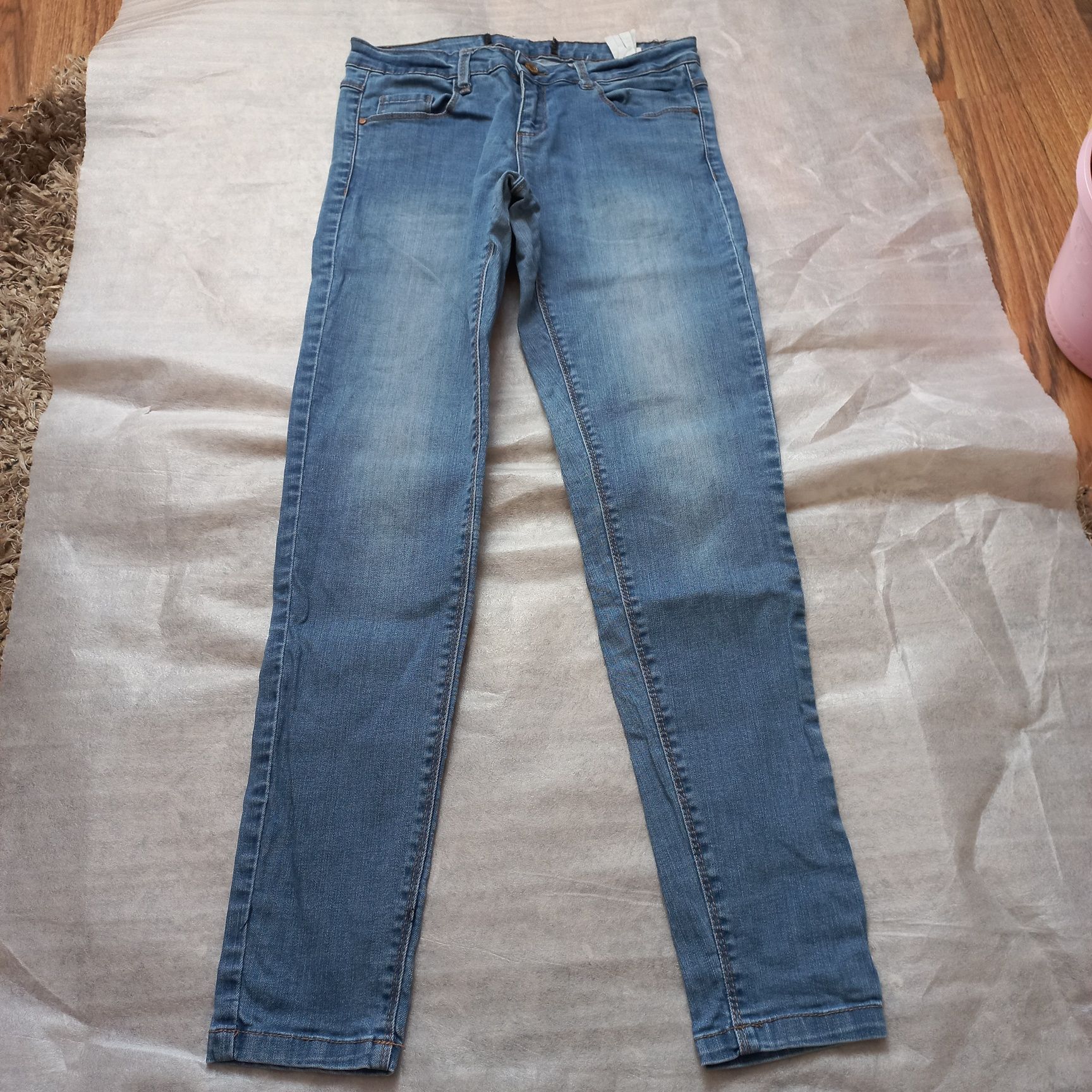 Spodnie damskie jeansowe cropp