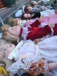 9 bonecas de porcelana e suporte