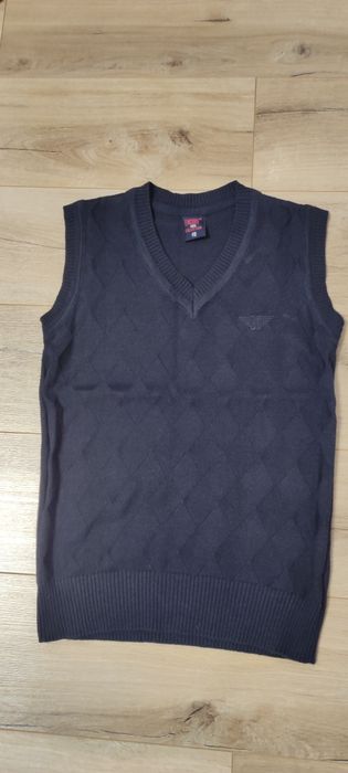 Шкільна дитяча жилетка