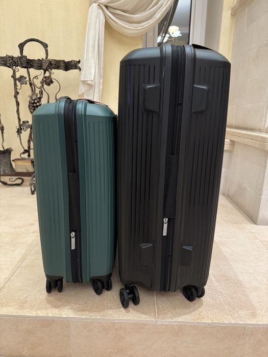 American tourister мала та снредня нові валізи