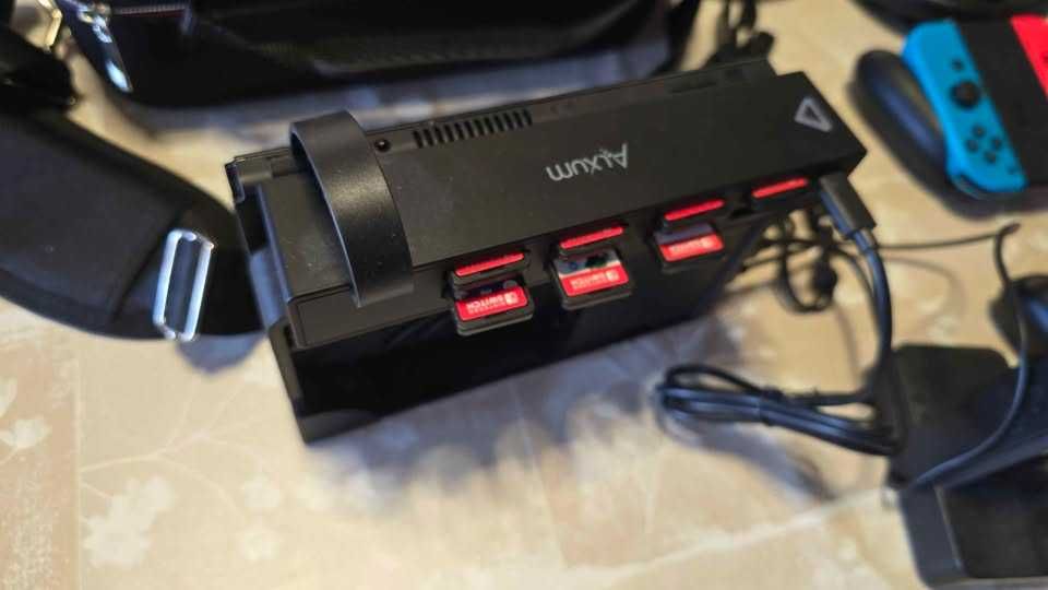 Nintendo Switch Oled + Mario Party Jamboree + FC24