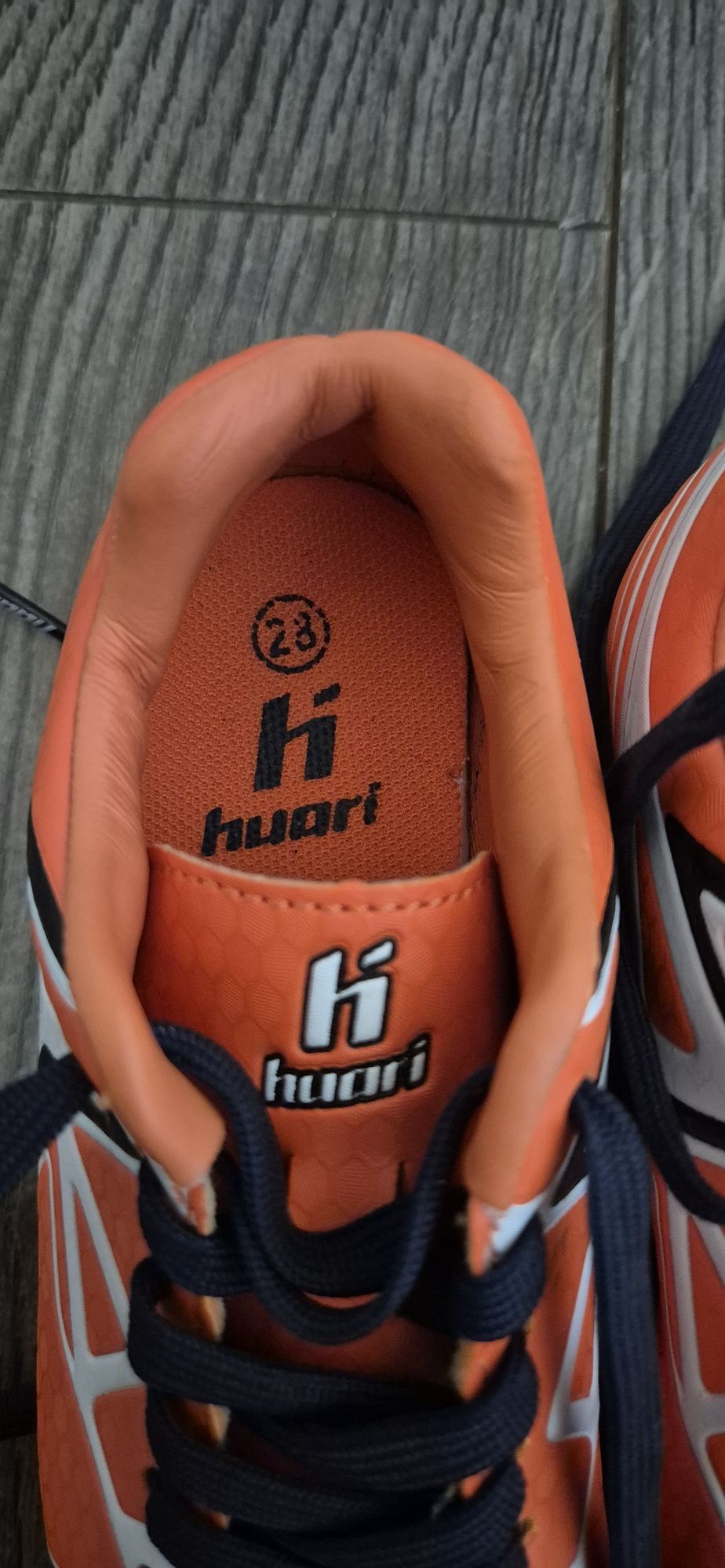 Korki buty piłkarskie dziecięce Huari r. 28 pomarańczowe
