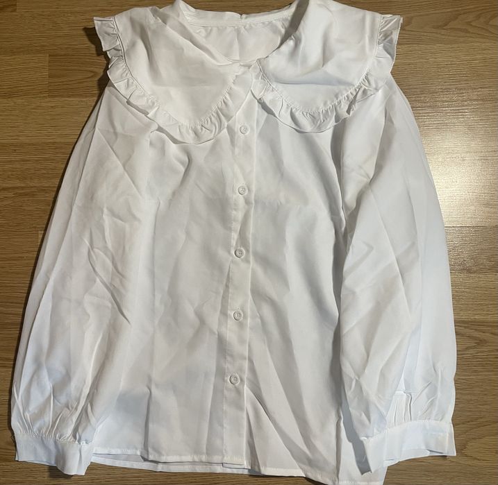 Блуза з оборками