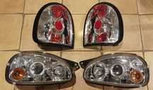 Lampy Angel Eyes przód i tył chrome tuning Opel Corsa B