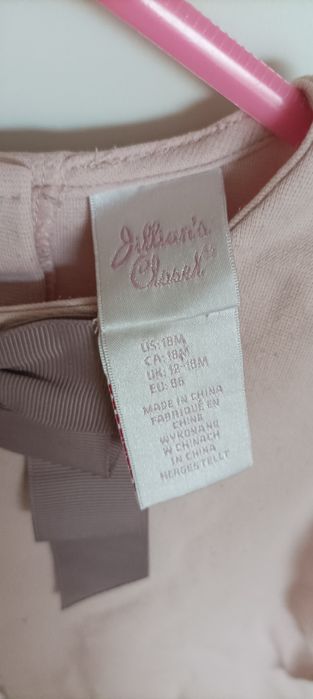 Elegancka sukienka różowa z kokardą 86 świąteczna