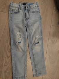 Spodnie jeansy dla chlopca z dziurami r.110 Reserved
