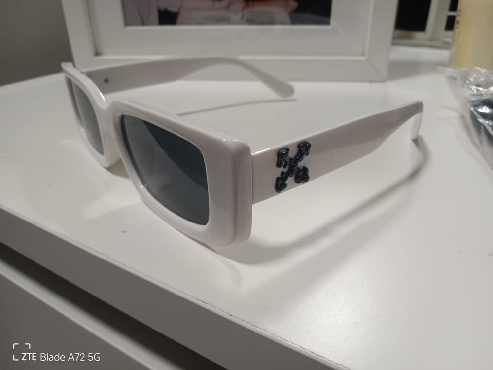Oculos de sol NOVOS