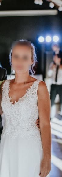 Elegancka, ręcznie haftowana suknia ślubna