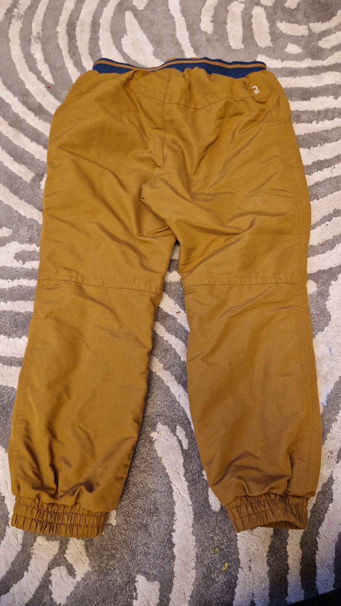 Ocieplane spodnie w kolorze brązowym, r.103-112
