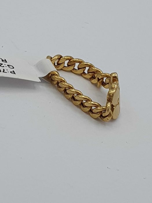 Złoty pierścionek Tous z diamentem P: 750/ G: 2,05/ CT: 0,02