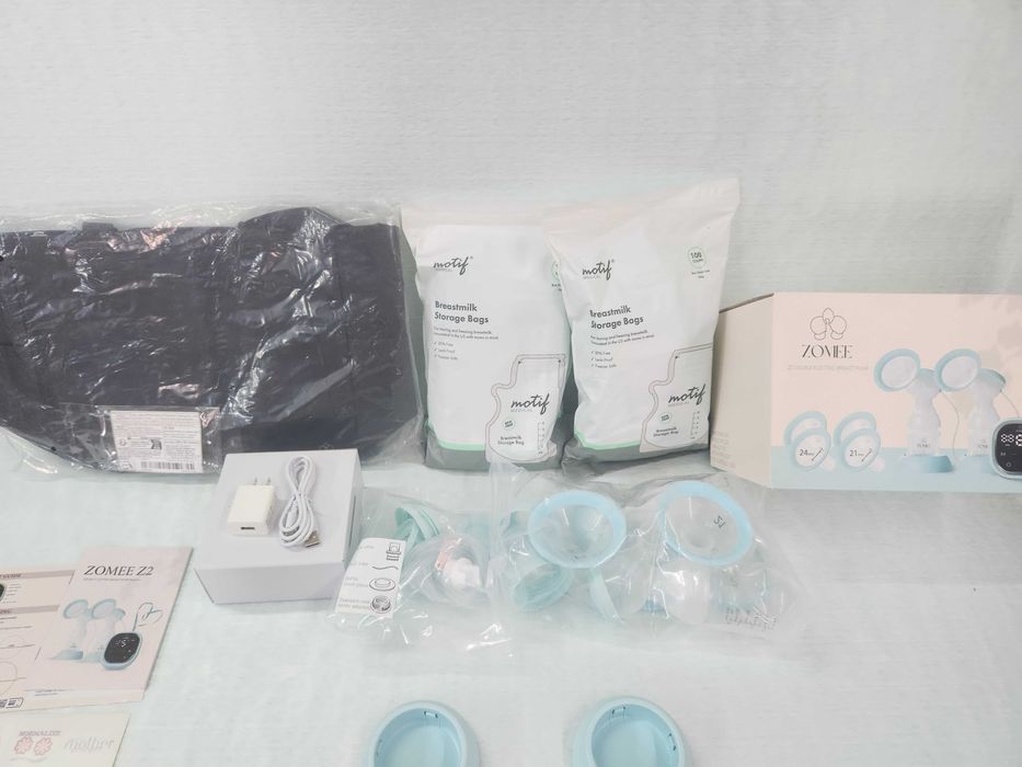 Zomee електричний молоковідсмоктувач