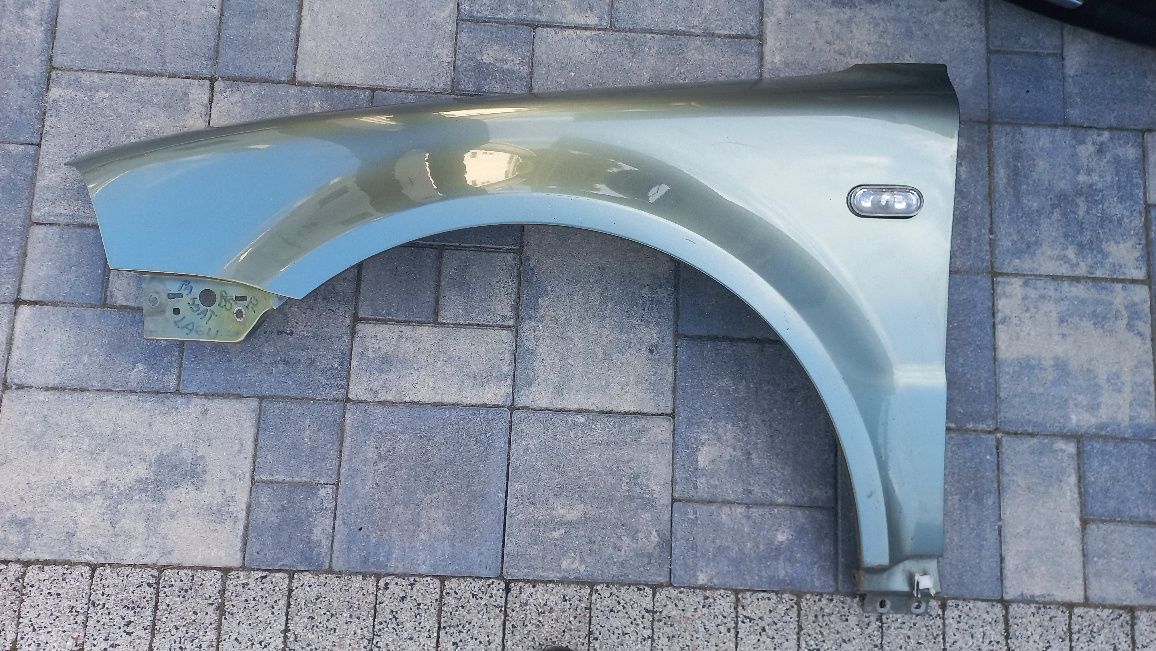 Vw passat b5 fl lift blotnik przedni lewy lb6w