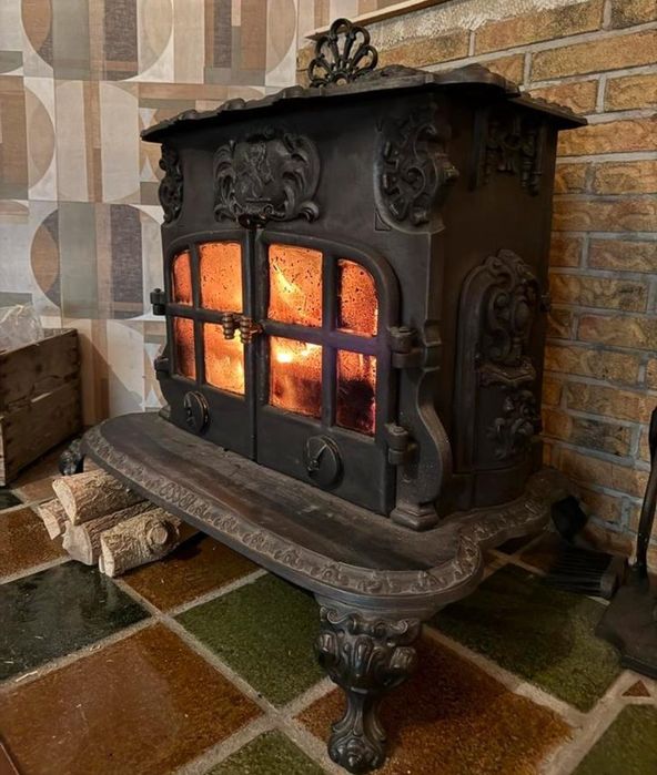 Kominek żeliwny wolnostojący