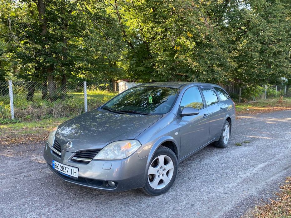 Нісан примера p 12