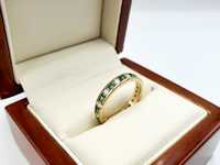 Złoty pierścionek z zielonymi oczkami 2,19g 333 8K R.12