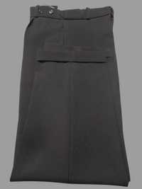 Czarne spodnie w kant r. 134