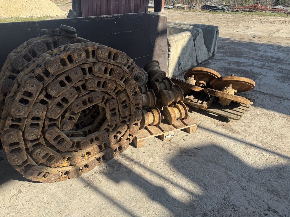 Podwozie łancuchy rolki kola CAT D6 system one