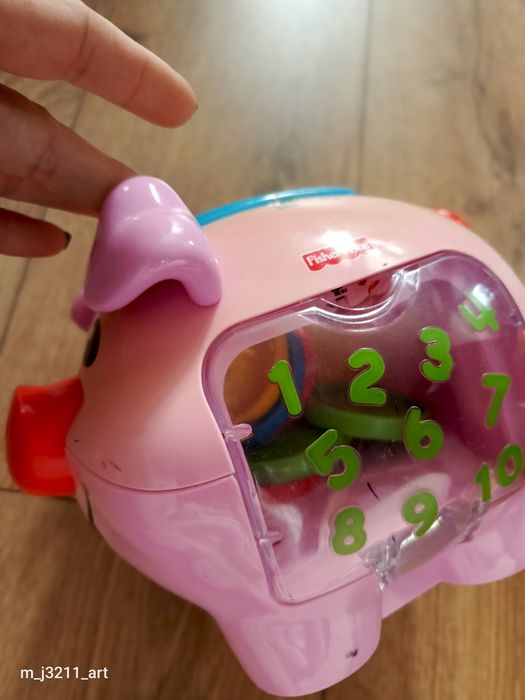 Świnka skarbonka Fischer Price