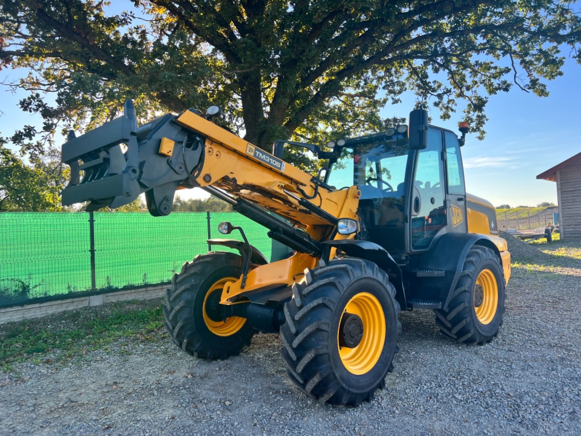 Ładowarka teleskopowa przegubowa Jcb TM 310S tm310s Agri