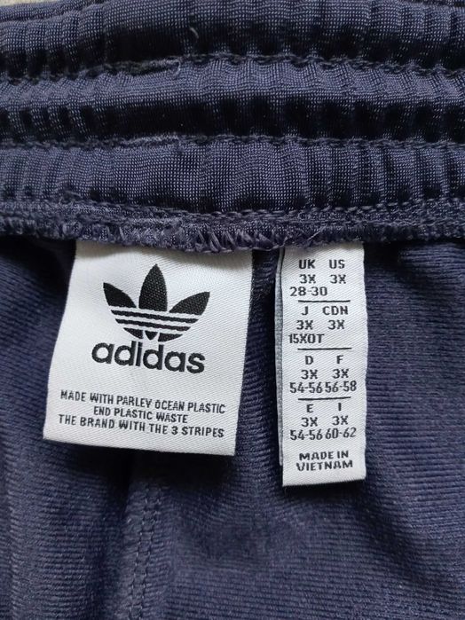 Damskie spodnie dresowe Adidas Adicolor Classics Firebird Primeblue