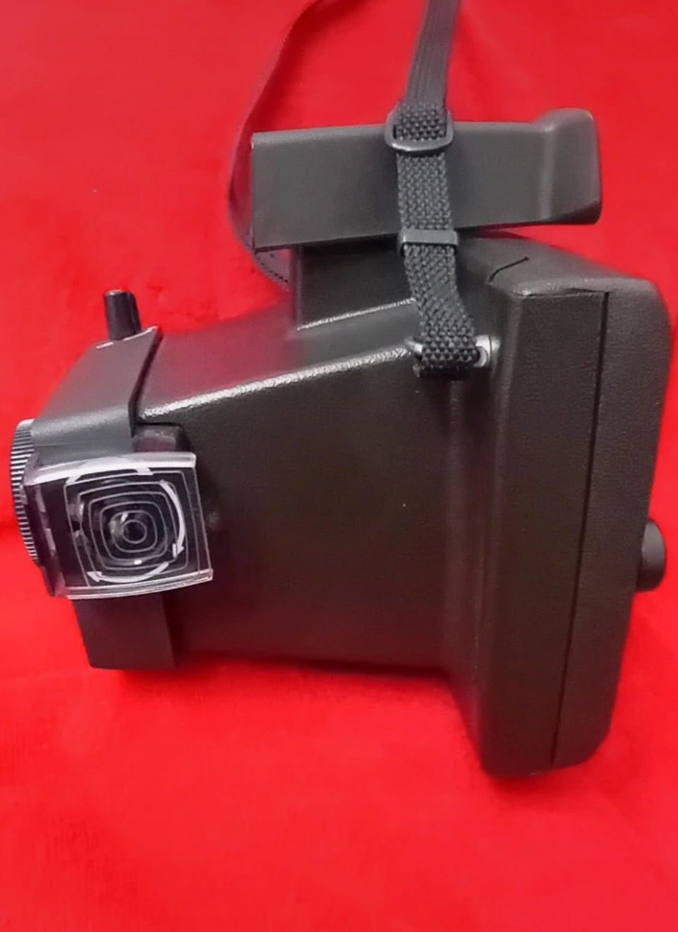 Máquina fotográfica antiga Polaroid EE33