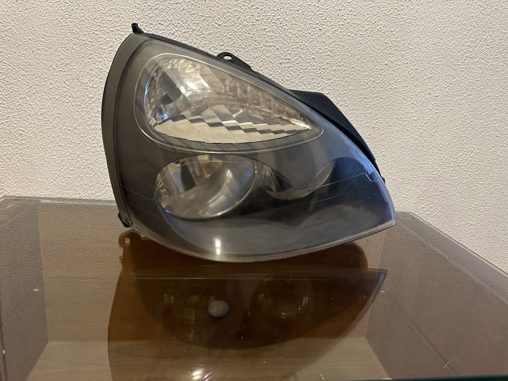 Farol direito renault clio 2004