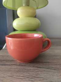 Pomarańczowa ceramiczna filiżanka porcelanowa pomarańcz na kawę