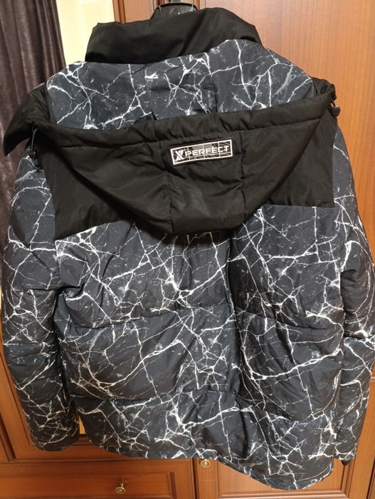 Зимова куртка на хлопчика 10-12 років