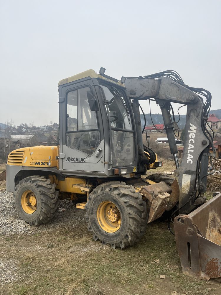 Продам ескаватор Mecalac 12 mxt