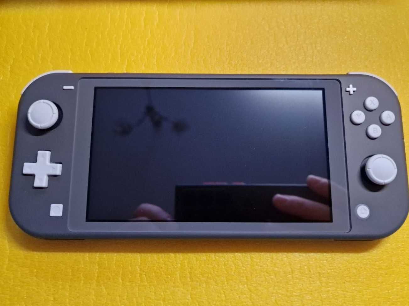 Нові Nintendo switch lite + iгри, кп 128 гб