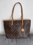Nowa torebka w logo marki Louis Vuitton