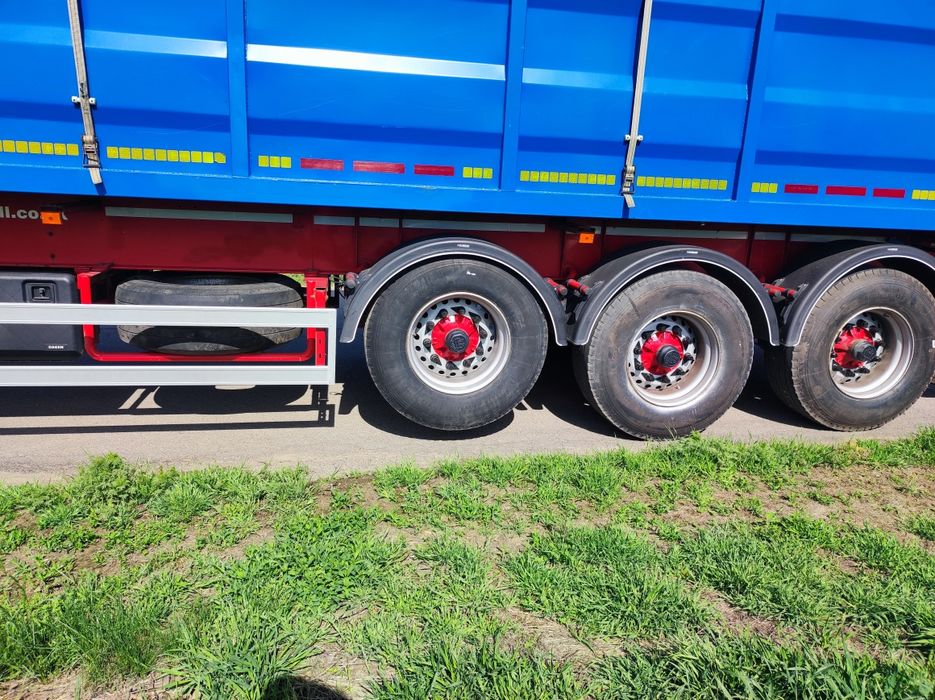 Самоскид контейнеровоз зерновоз заводський полуприцеп 68 кубів