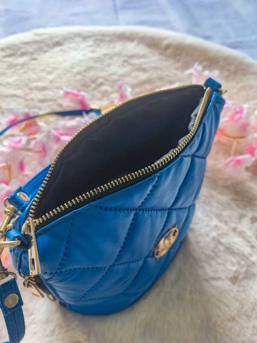 Chabrowa pikowana torebka, worek, Laura Biaggi, 2 paski