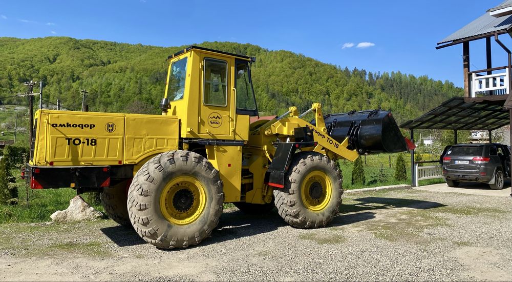 Амкадор ТО-18 навантажувач