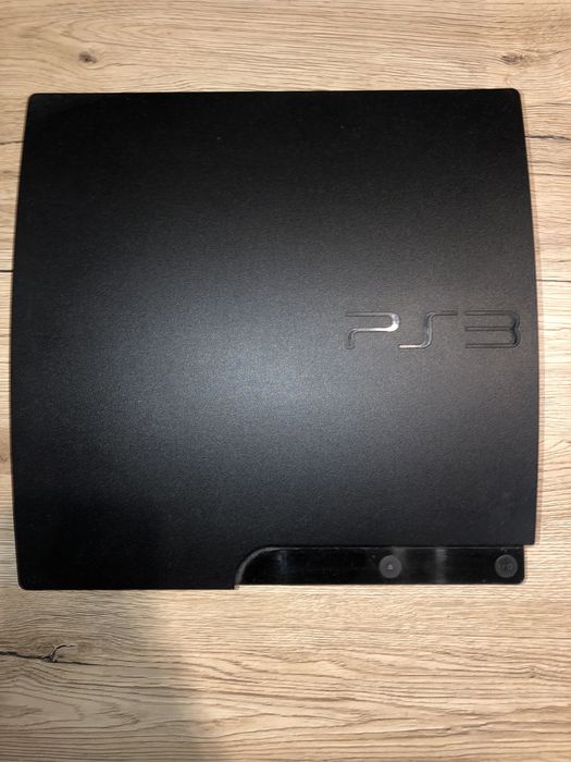 Playstation 3 slim + gry