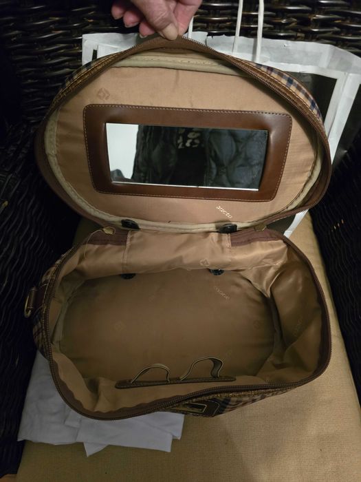 Malote de viagem em tecido de xadrez