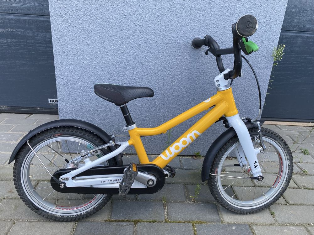 Rowerek woom 2 żółty z błotnikami