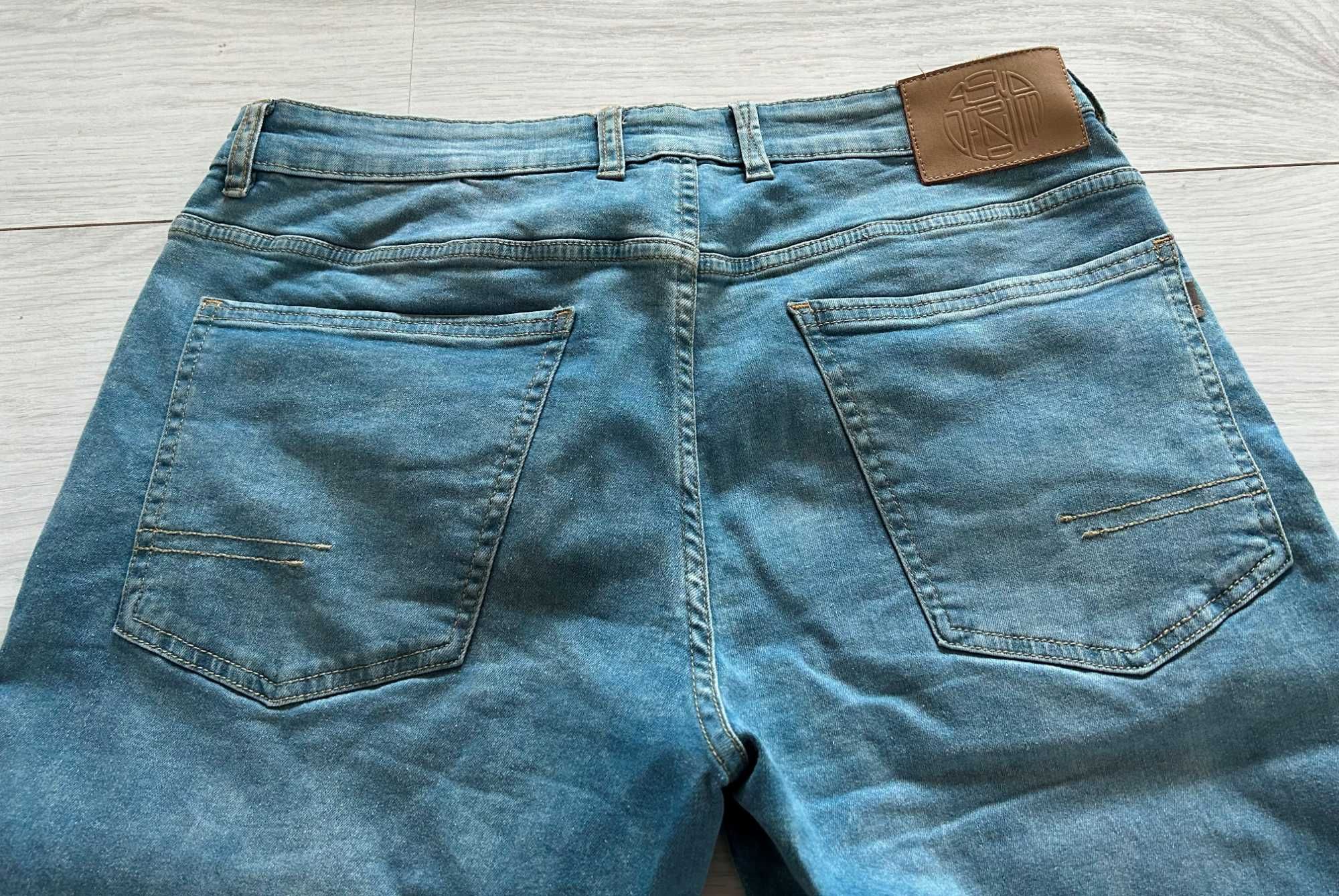 Spodnie jeans Reserved 33/34